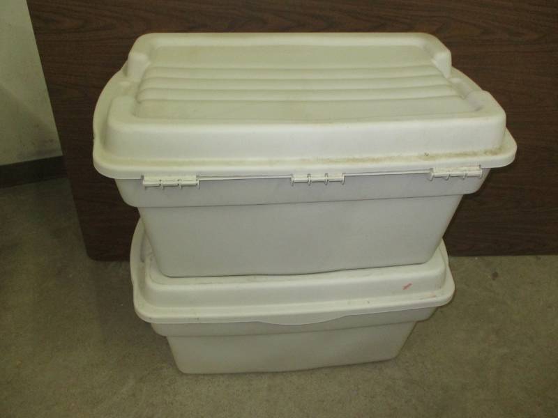 lot 55 image: 2 Large Tubs covers are attacked  30longx 16 high x 17