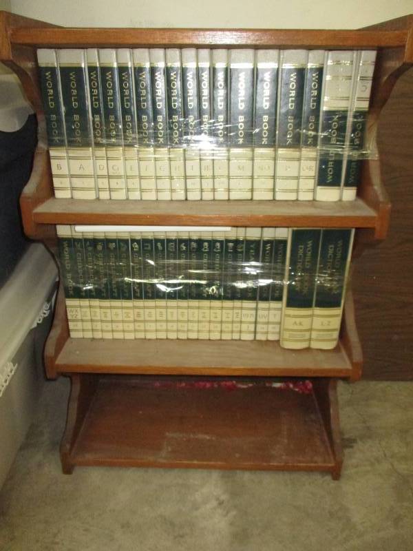 lot 58 image: Book case full of encyclopedias