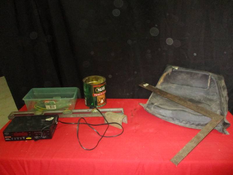 lot 59 image: Mower seat, Fishing supplies, Square, Clock radio and Hose connectors and level