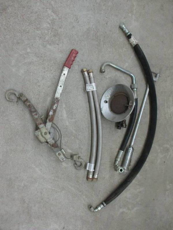 lot 95 image: Cumalong, heavy duty hoses , boat light and sunflower heeter top