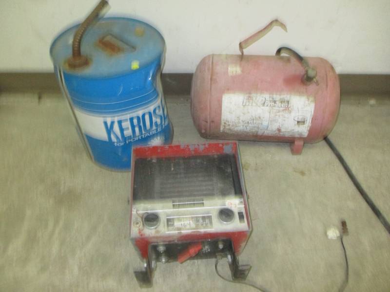 lot 97 image: Air Tank, vintage tractor radio, kerosene can