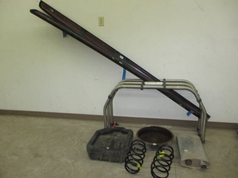 lot 101 image: truck bar, side pieces, oil pan, springs see oics and muffler
