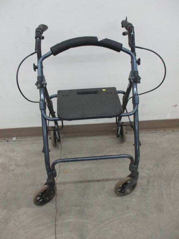 lot 103 image: Walker with seat