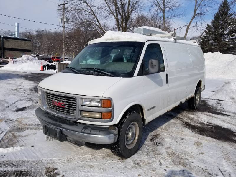 1999 GMC SAVANA 1 Ton Cargo Van with Roof Rack and Four Rear Bench Passenger Seats