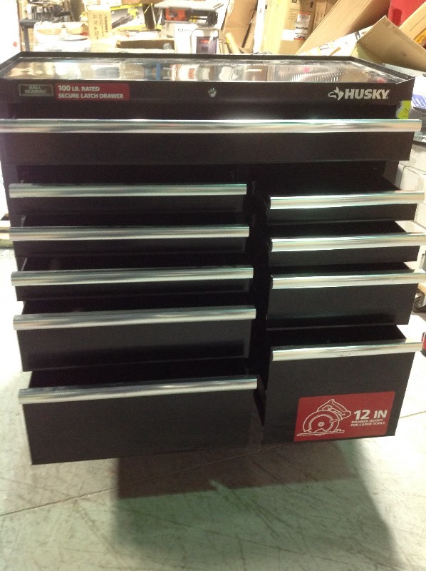 Husky 41 in. 10 Drawer Tool Cabinet  Black in good conditions whit dents and scratch on the back sides