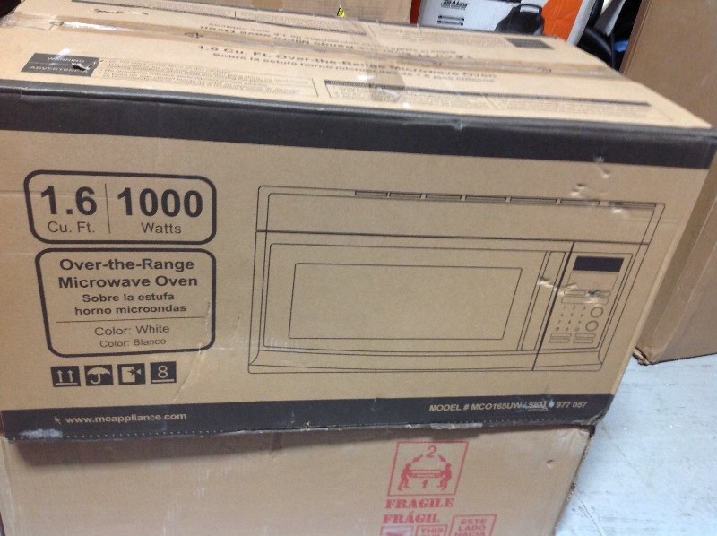 Magic Chef 1.6 cu. ft. Over the Range Microwave in White in good conditions