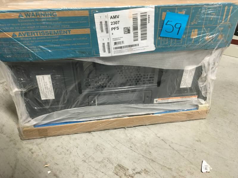Amana 1.6 cu. ft. Over the Range Microwave in Stainless Steel  in like new condition