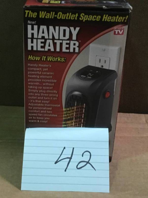 lot 42 image: 350-Watt Wall Outlet Handy Heater  in like new condition