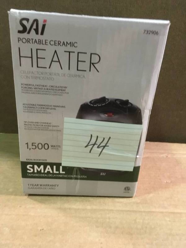 lot 44 image: 1,500-Watt Convection Electric Portable Heater and Fan  in like new condition