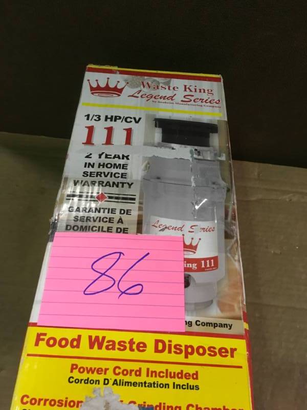 lot 86 image: Waste King Legend Series 13 HP Continuous Feed Garbage Disposal  in like new condition