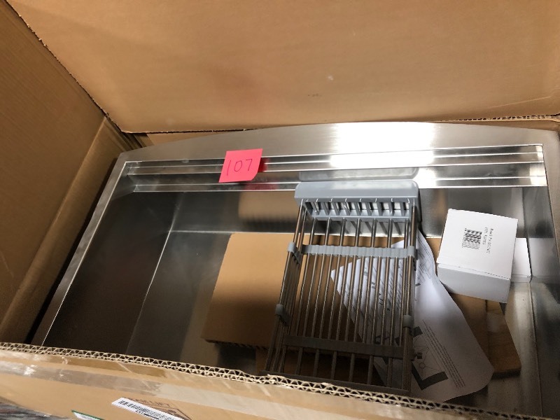 lot 107 image: AKDY Handcrafted All-in-One Apron Mount 33 in. x 22 in. x 9 in. Single Bowl Kitchen Sink in Stainless Steel with Accessories in good conditions