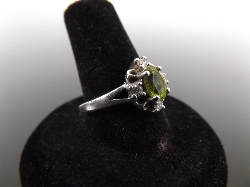 lot 11 image: .925 Sterling Silver Faceted Peridot Crystal Accented Ring Size 8.25