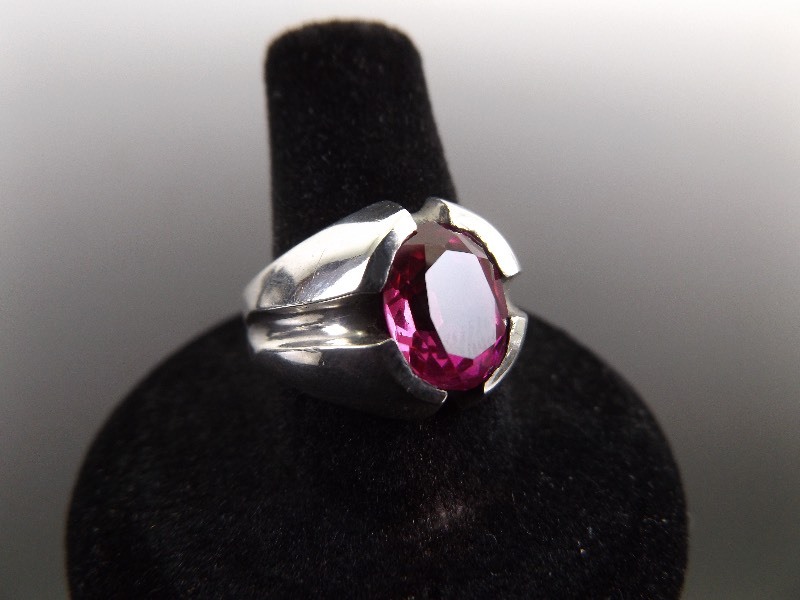 lot 16 image: .925 Sterling Silver Faceted Pink Garnet Ring Size 10