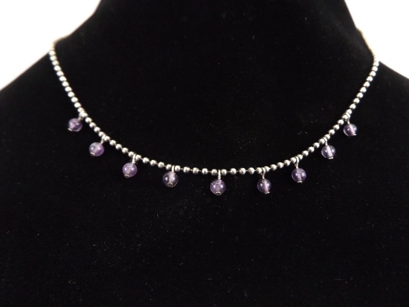 lot 44 image: .925 Sterling Silver Amethyst Seed Necklace