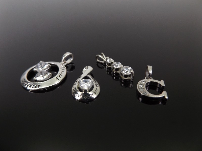 lot 53 image: 4 Crystal .925 Sterling Silver Pendants