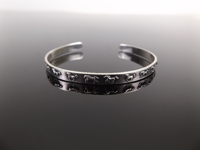 lot 67 image: .925 Sterling Silver Equestrian Themed Open Bangle Bracelet