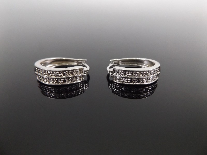 lot 83 image: .925 Sterling Silver Diamond Accented Earrings