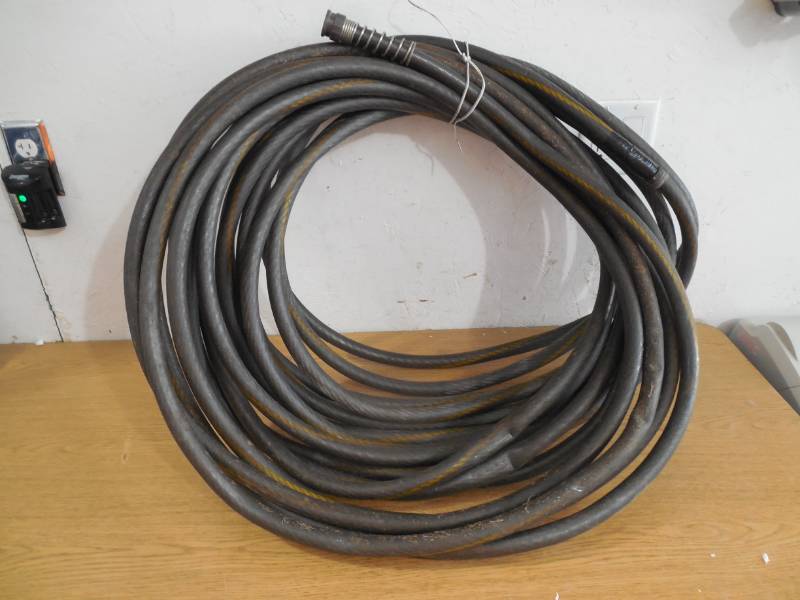 lot 35 image: 100 GARDEN HOSE
