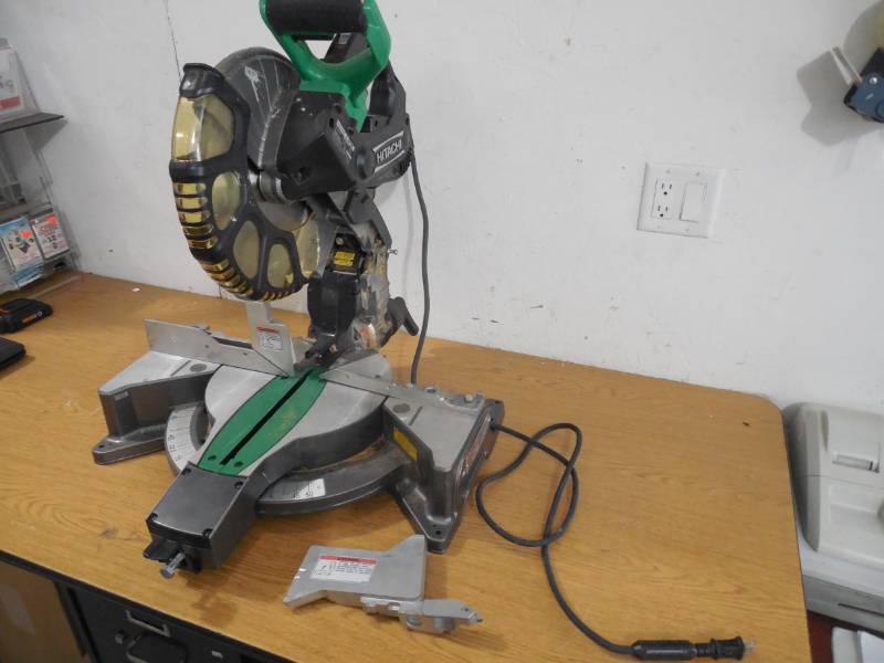 lot 81 image: Hitachi 12-in 15-Amp Dual Bevel Laser Compound Miter Saw