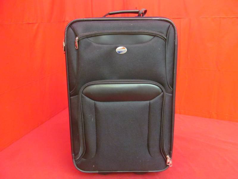 lot 31 image: American Tourist luggage