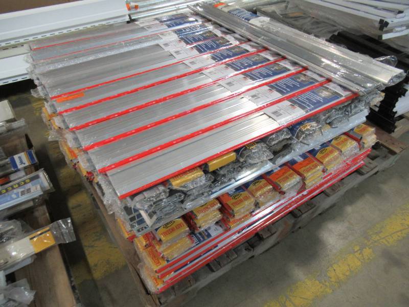 lot 53 image: Pallet of M-D Building Products 36 in. x 1-18 in. x 3-34 in. VinylAluminum Deluxe High and Low Thresholds - Approximately 150