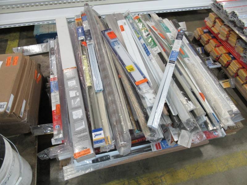 lot 54 image: Mixed Pallet of Door Sweeps, Thresholds And More Approximately 100 Pieces.