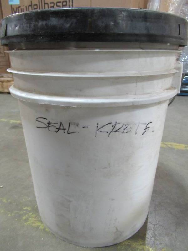 lot 136 image: MYSTERY 5 GALLON CONTAINER - Think It may be SEAL KRETE