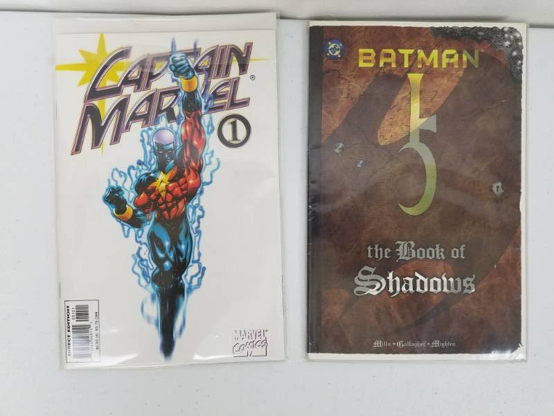 lot 23 image: 2 comic books Captain Marvel & Batman Book of Shadows