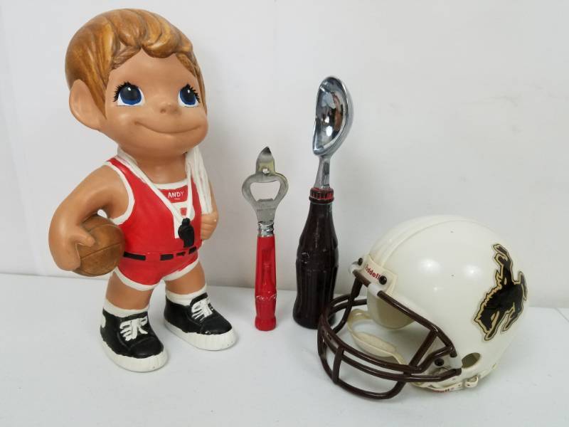 lot 24 image: Lot of Vintage Collectibles Coca Cola & Andy Statue & Football Helmet