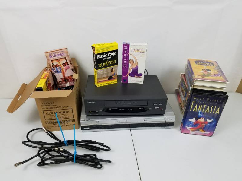 lot 54 image: Huge lot of VCR tapes and Daewood VCR