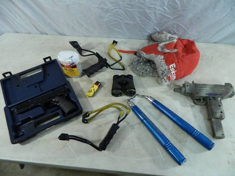 lot 77 image: BB Gun, Nunchuks, Eskimo Hat, and More