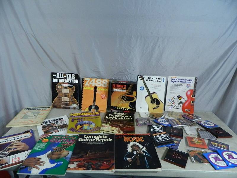 lot 95 image: Guitar Books and Strings