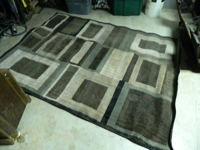 lot 106 image: 62 x 86 Area Rug