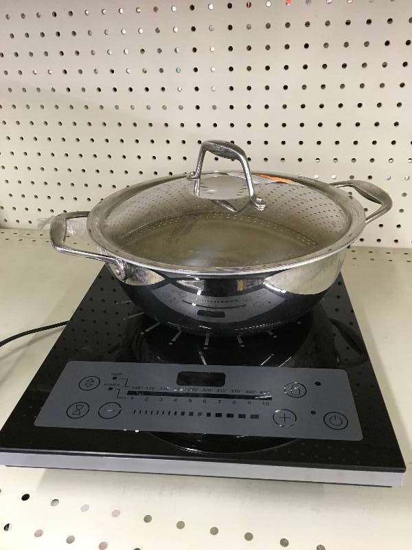 lot 337 image: Tramontina 3 PC Induction Cooking System, Retail $69.99