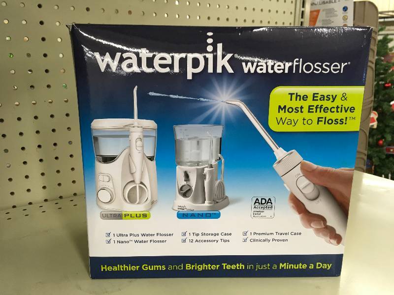lot 346 image: Waterpik Water Flosser, Retail $79.99
