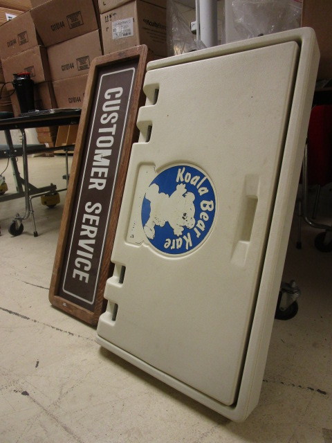 lot 904 image: CHANGING STATION  CUSTOMER SERVICE SIGN