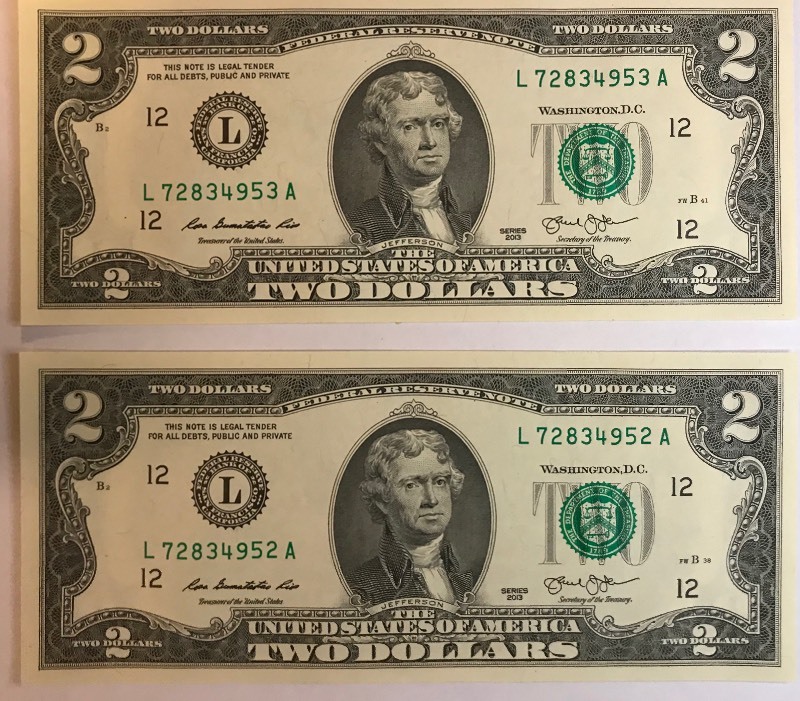 lot 21 image: Two Crisp Federal Reserve $2 Bills