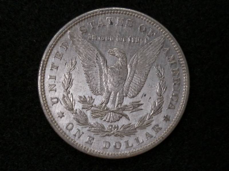 1879 Rev 79 AU Morgan Silver Dollar...