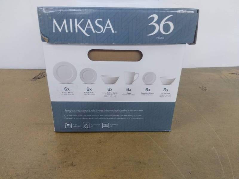 lot 17 image: Mikasa Trellis 36-piece Bone China Dinnerware Set