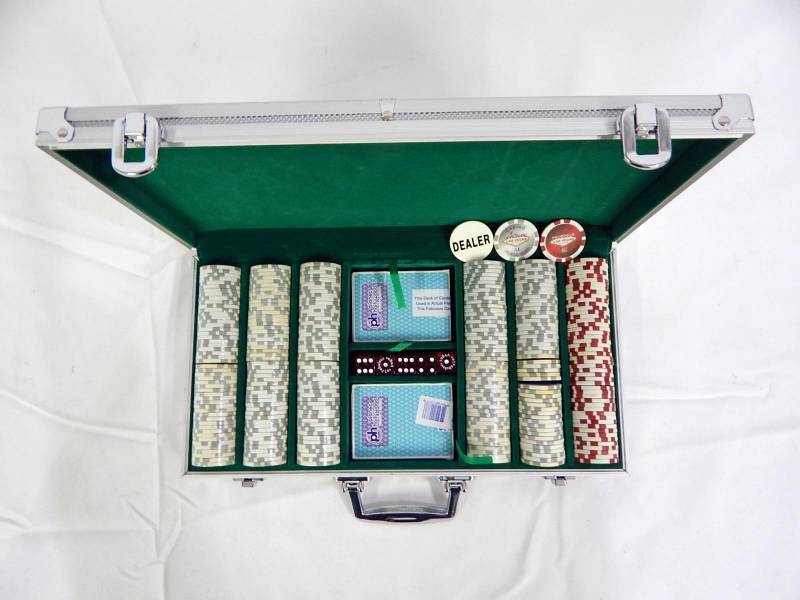 lot 115 image: 300 Chip Aluminum Poker Chip Case with Playing Cards, Dice and Las Vegas Theme Multi-Denomination Chips