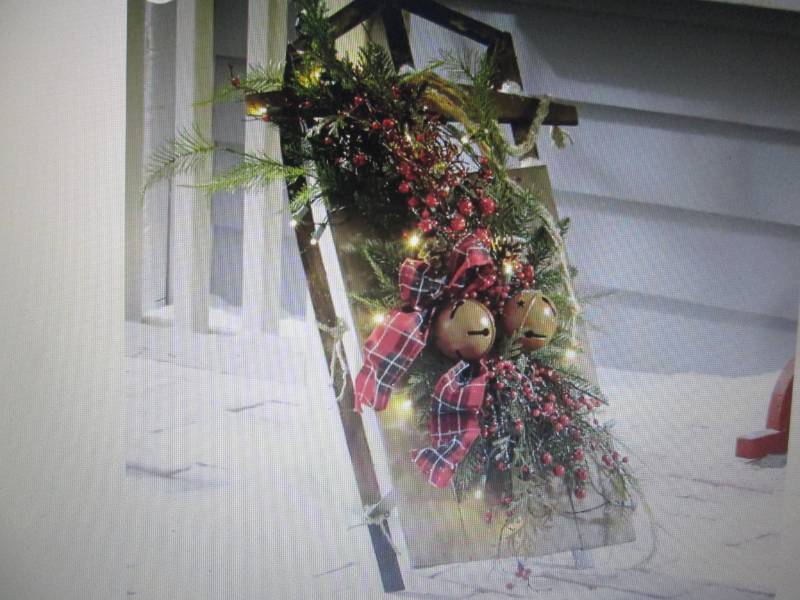 lot 14 image: Plaid Decorated Sled open box, unte...