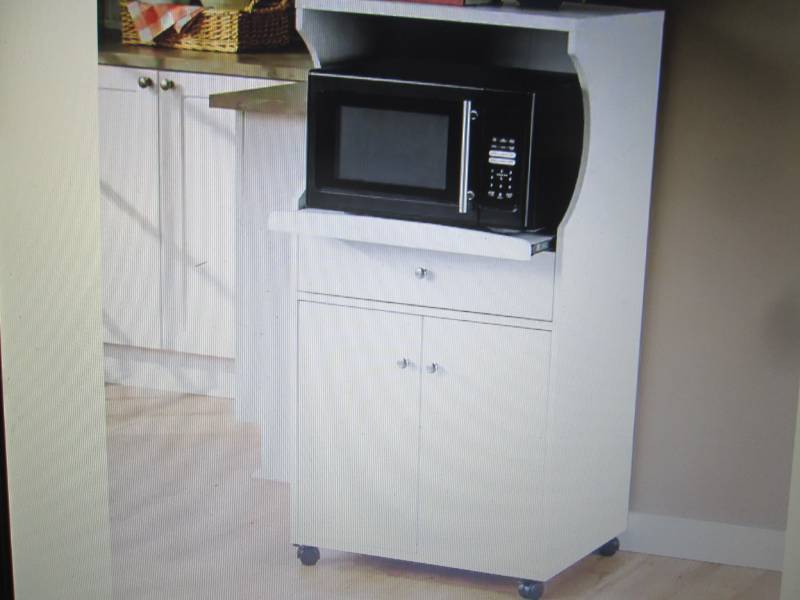 lot 34 image: Alice Rolling Microwave Stand open ...