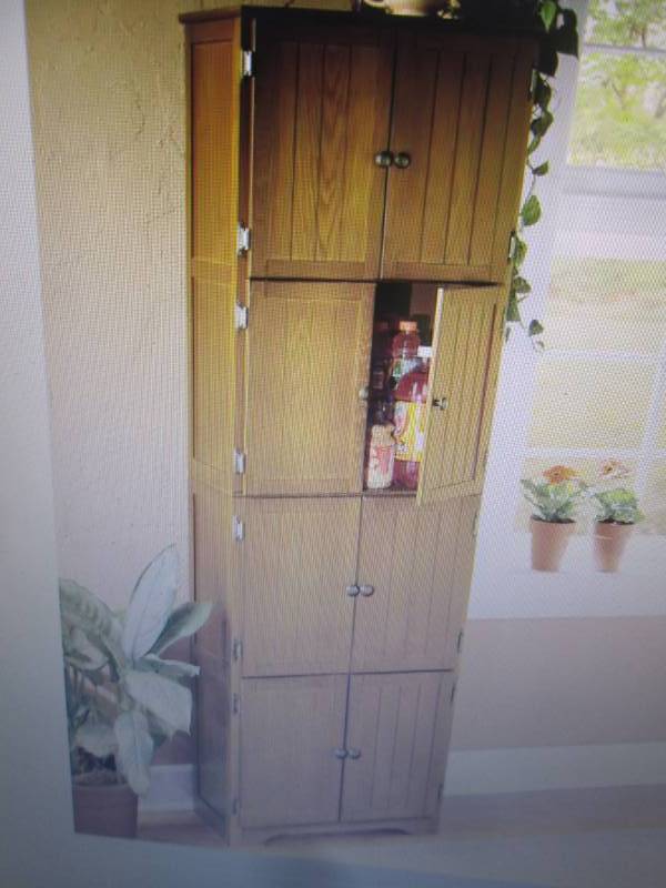 lot 101 image: 8 Door Wall Cabinet open box Retail...