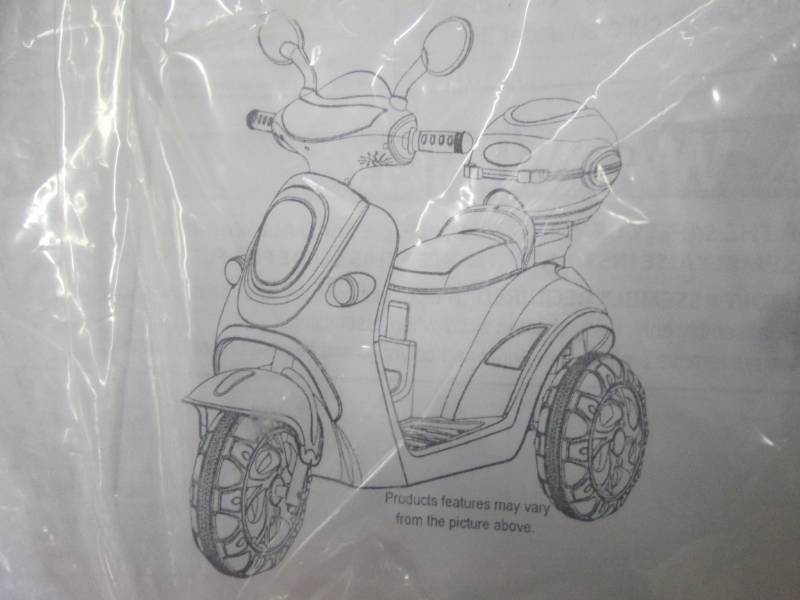 lot 135 image: Ride-on Pink Motorcycle open box As...