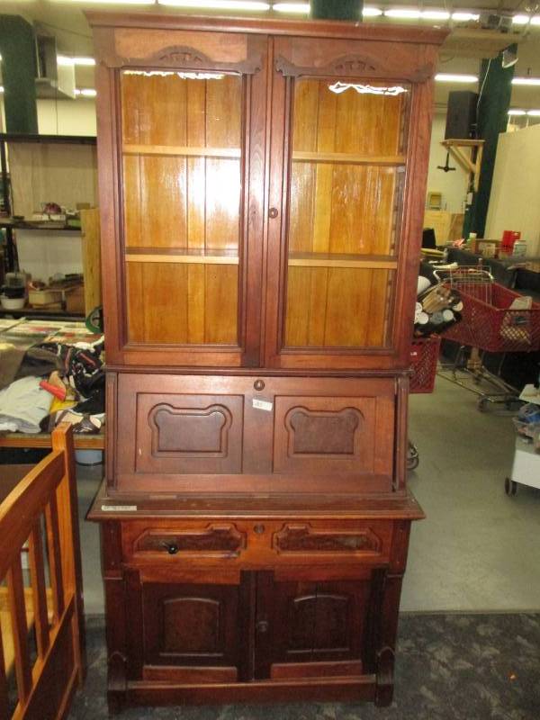 Beautiful Antique SecretaryHutch with Metal wheels and slant down desk