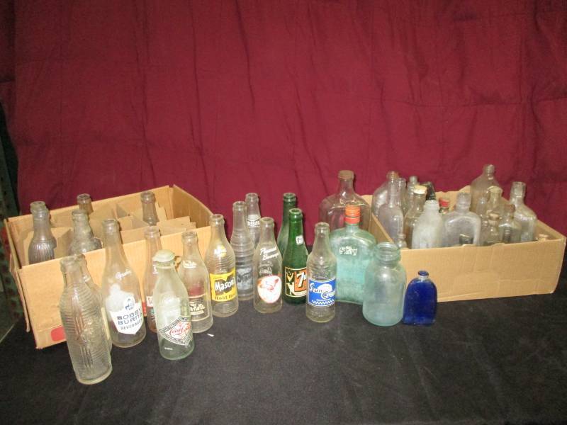 Antique pop bottles and bottles
