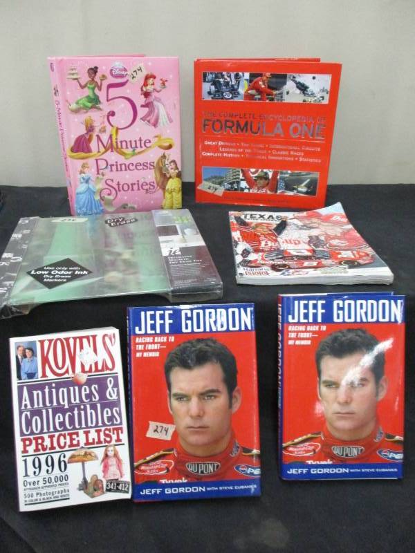 Dry erase board, Jeff Gordon, antiques book , Texas motorspeed, encyclopedia formula one and princess stories