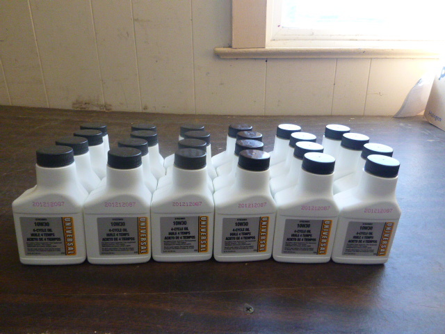 lot 14 image: 24 NEW Unopened Bottles of Universal 10W30 4-Cycle Oil