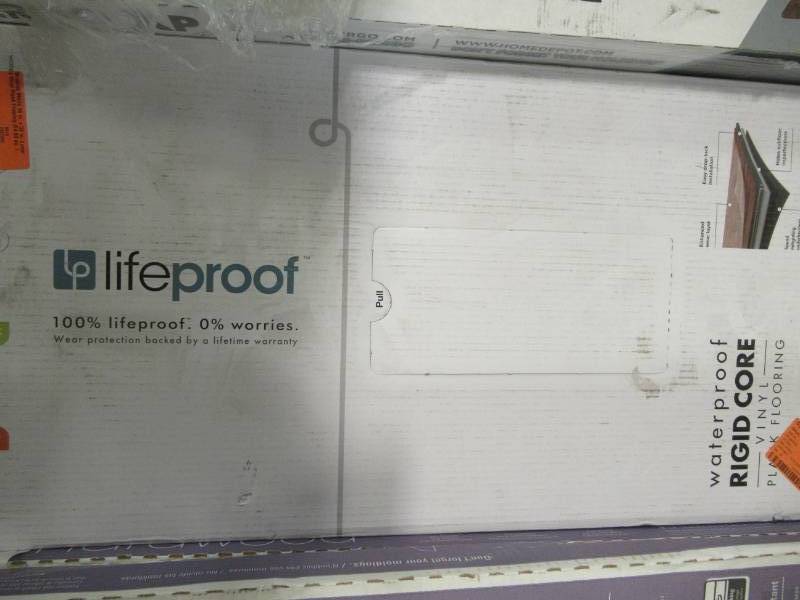 lot 22 image: Lifeproof Brushed White 16 in. x 32 in. Luxury Vinyl Plank Flooring (24.89 sq. ft.  case) - 2 Cases