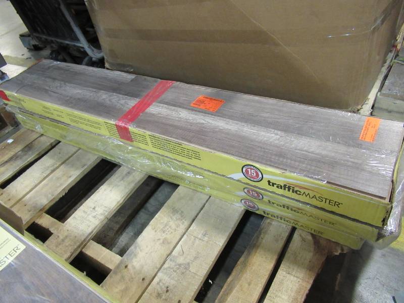lot 36 image: TrafficMASTER Hand scraped Saratoga Hickory 7 mm Thick x 7-23 in. Wide x 50-58 in. Length Laminate Flooring (24.17 sq. ft.  case) - 3 Cases